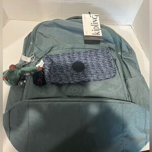 Kipling brand backpack "Light Aloe" featuring a patterned pouch